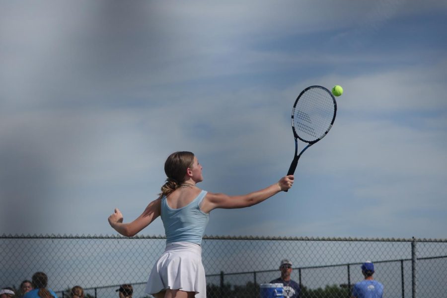 8th grader Avery Kirwan returns the ball to her opponent on the 1st home tennis meet on Thursday, Sept. 1.