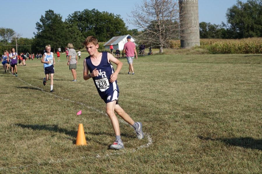 On Tuesday, Sept. 6th, at Wamego, Aiden Remmert runs at the first Cross-Country Meet. Remmert said that his favorite part of the meets is “The competition between me and my friends and just trying to get to the top.”