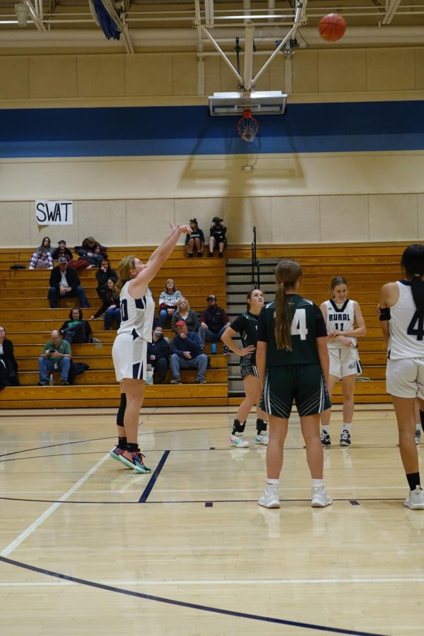 8th grader Kaylin Peterson shoots a free throw at the game against Eisenhower on November 15th.