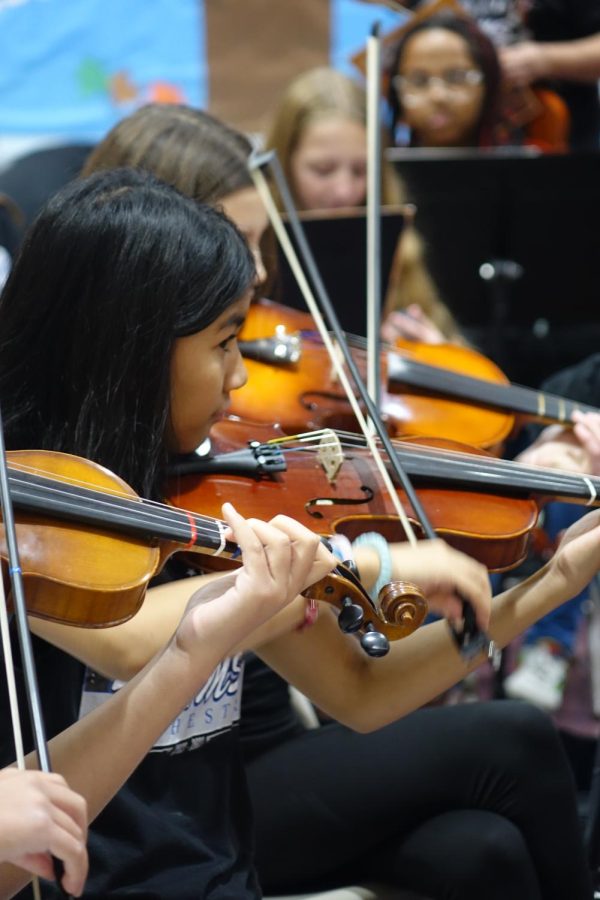 WRMS 7th grade orchestra students perform on their music tour on November 10th. They visited two elementary schools and tried to recruit incoming students to come and play for the WRMS orchestra. Caption by MyLee Mullins.