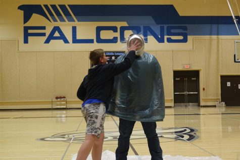 Eighth grader Cole Spitler
smashes a pie in Mr. Lambottes face for being the top seller out of both Mr. Lambottes 1st and 3rd hour. 
