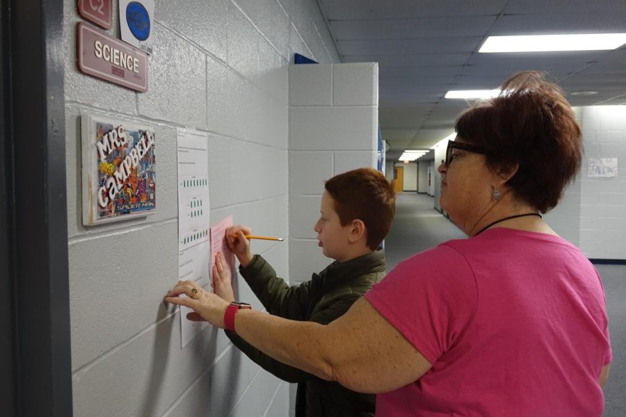 On January 26th, 7th grader Iain Singer works on a Science Scavenger hunt in Mrs Campbells 3rd hour class with the help of Mrs. Rheim to help review for the test. Story by Rylie Wessel.  