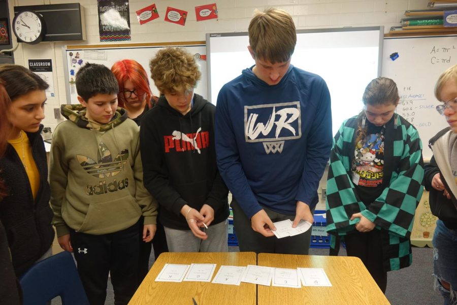 Mrs. Wilcox’s 3rd hour participates in a Pi Day activity on Thursday March 9th. Pi Day falls on March 14th, which was over spring break so they celebrated early.