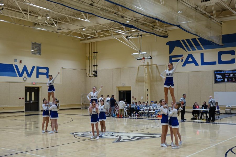On January 3rd, the WRMS 8th grade cheer squad does a quarter cheer during the game against Eisenhower.