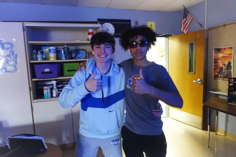 On Thursday March 9th, Brennan Dalrymple and Braylon Doleman pose for a photo in  Mr. Buche’s room right before they go do the H.E.A.T team stations celebrating the end of the third quarter. Caption by Brylie Pollet.