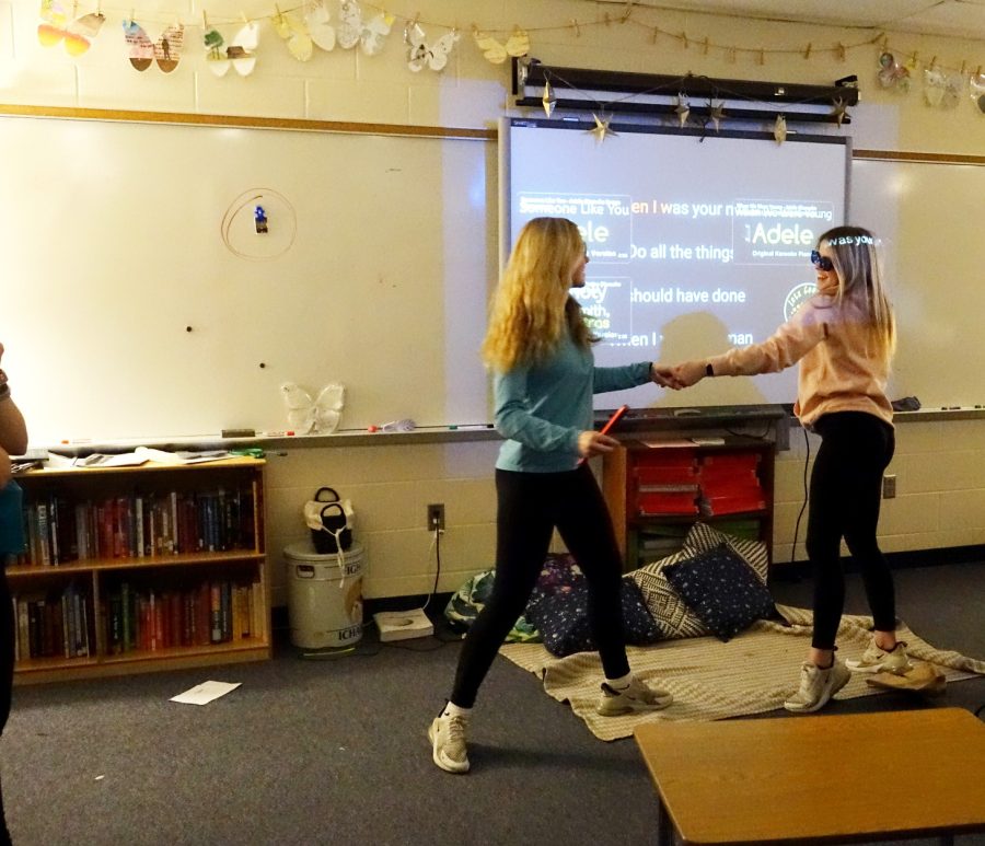 Jolie Workman (8) and Aubrey Shandler (8) dance and sing to Karaoke on Thursday March 9th in Mrs .Murphy’s room. The Wave team celebrated the end of the 3rd quarter by doing whatever activities they wanted in Advisory.  Caption by Gracie Hayes.
