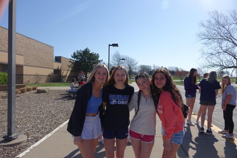 8th grade students, Jolie Workman, Evie Blow, Brylie Pollet, and Stella Berry stop for a picture while waiting in line for their Kona Ice, which was made possible by the spanish teacher Mrs. Terrell.  When asked if we should do Kona Ice again, Berry said, “Yes, because it was fun.”
