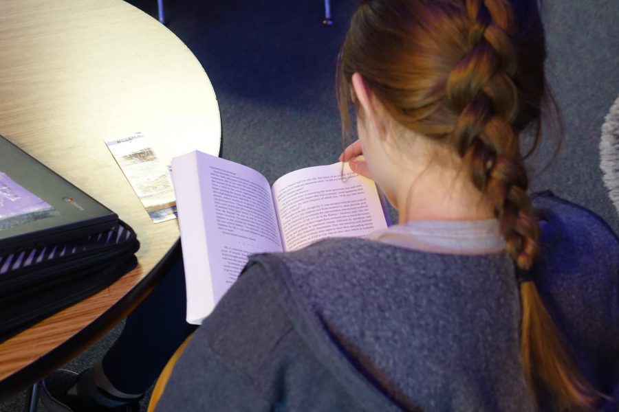 On May 3rd, 7th graders in Ms. Speagle’s class read books during 3rd hour. 7th grader Eleanor Knudtson reads “Life in a Jar.” Knudtson said that in her book, the character “can see glimpses of the past because it goes between a history day project and current day history and I was in History Day.”

