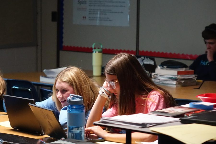 7th graders Reese Bruna & Callie Simonsen learn about Kate Richards O’Hare and the Kansas reforms on Tuesday, May 2nd in Mr. Millss class. Simonsen said about the lesson, “Most of the time history is a hit or miss with lessons but this one is pretty fun.” 