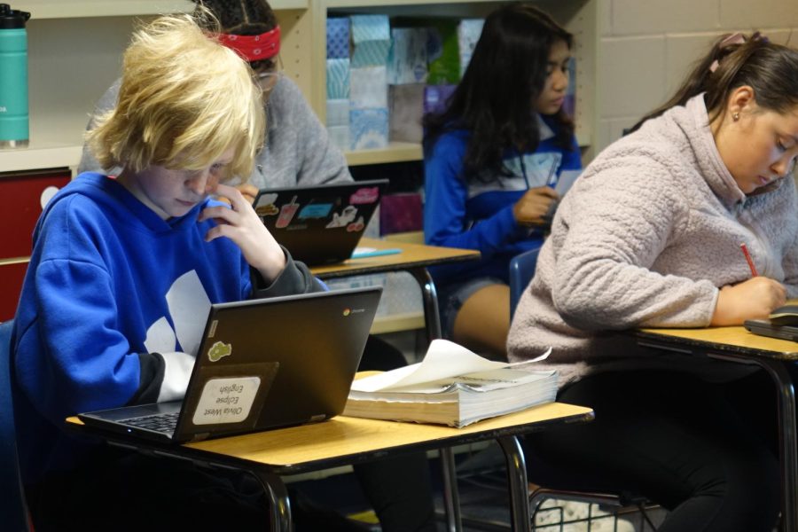 On Wednesday, May 3rd, 7th grader Hudson Rannebeck peer edits an assignment with peers in Mrs. Chooncharoens 3rd hour class. “They have been working on writing an argument on if farmers are guilty or not,” said Chooncharoen.

