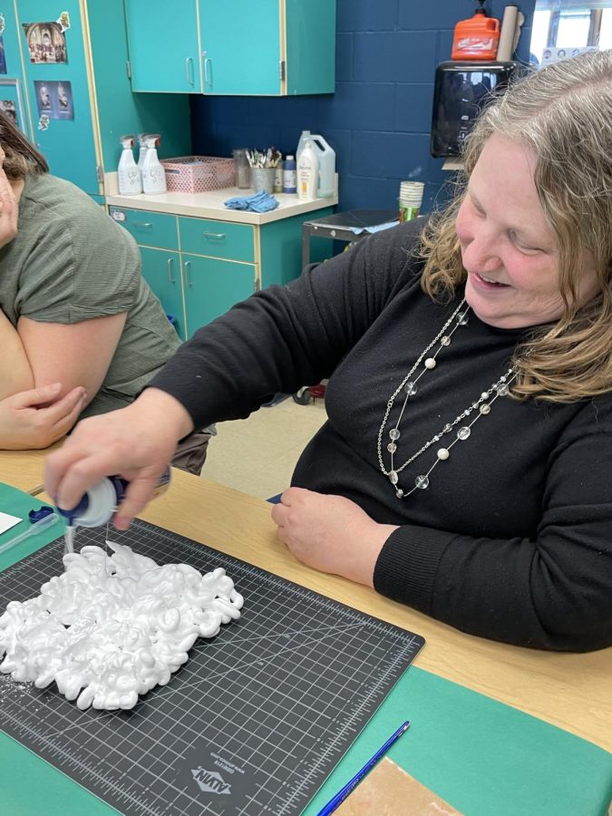 Mrs. Hobelman makes shaving cream art with the WRMS staff on March 29th. The staff meet monthly to do fun activities and grow closer together.