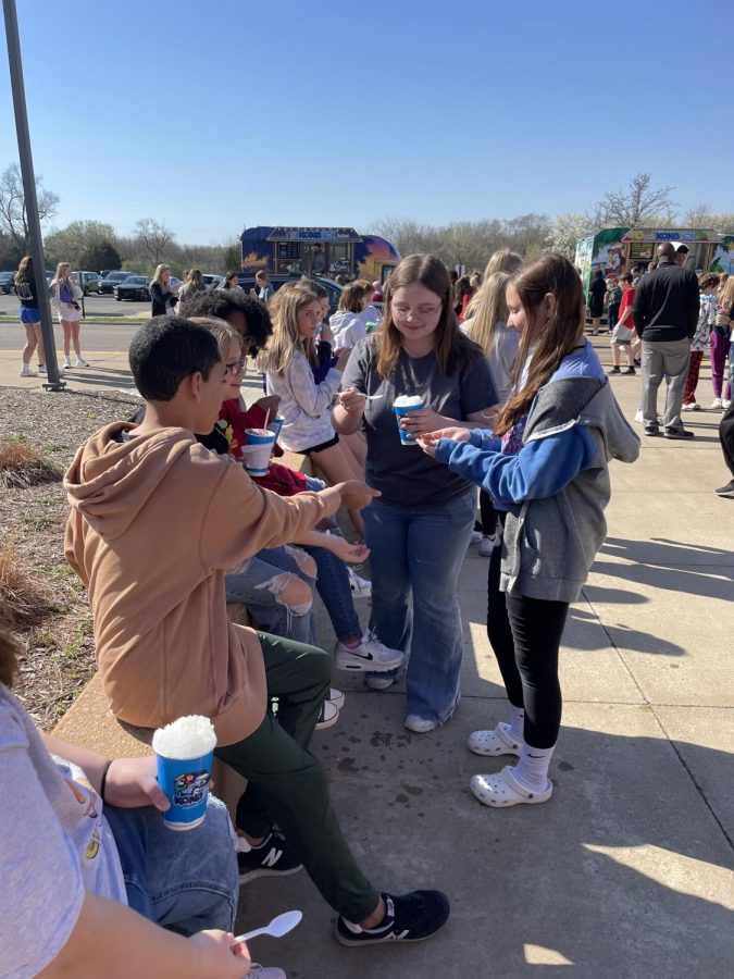 On April 11th, 8th graders gather around while eating their Kona Ice during FAST, which was made possible by Spanish teacher Mrs. Terrell.