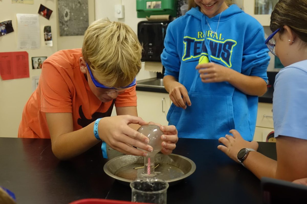 On Tuesday, Sept 19th, 7th grader Cooper Strathman, and his classmates participate in a candle lab in All Star science teacher Mrs. Campbell’s 3rd hour in room C2.