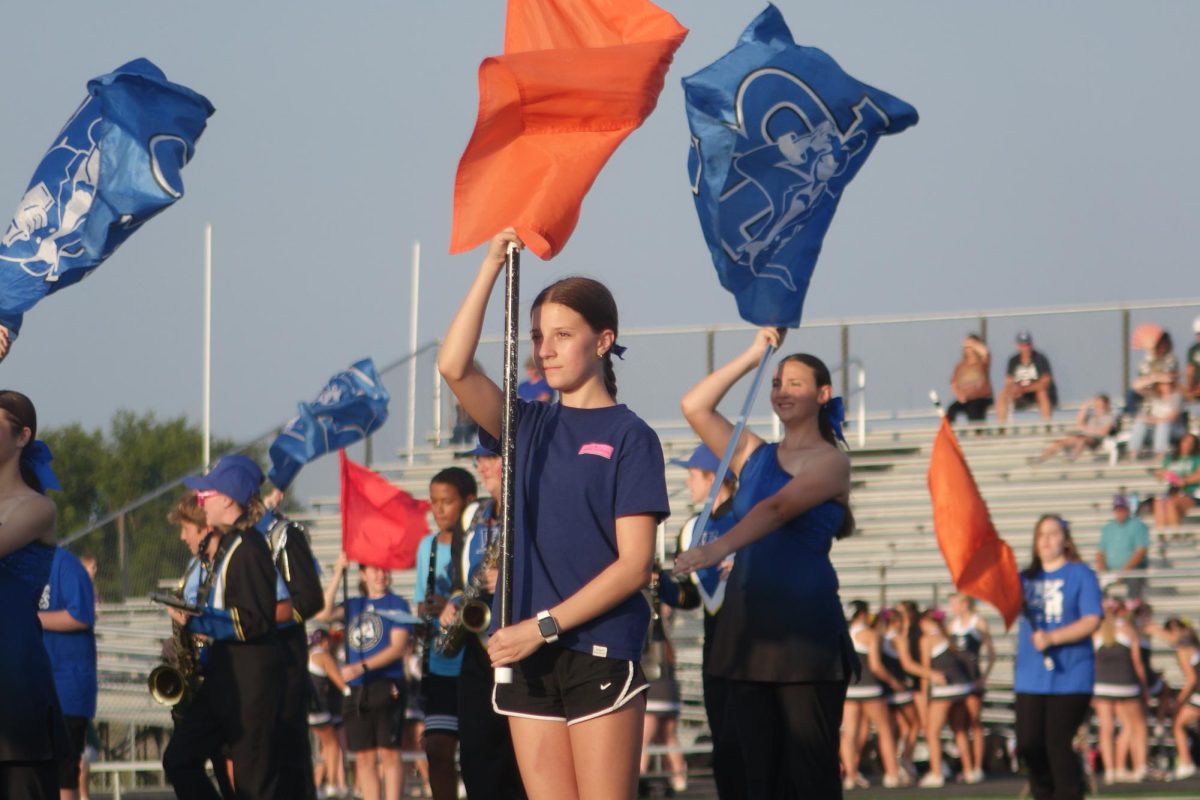 The 8th grade color guard performs their routine during pregame for the high school football game against Desoto on September 8th. 
