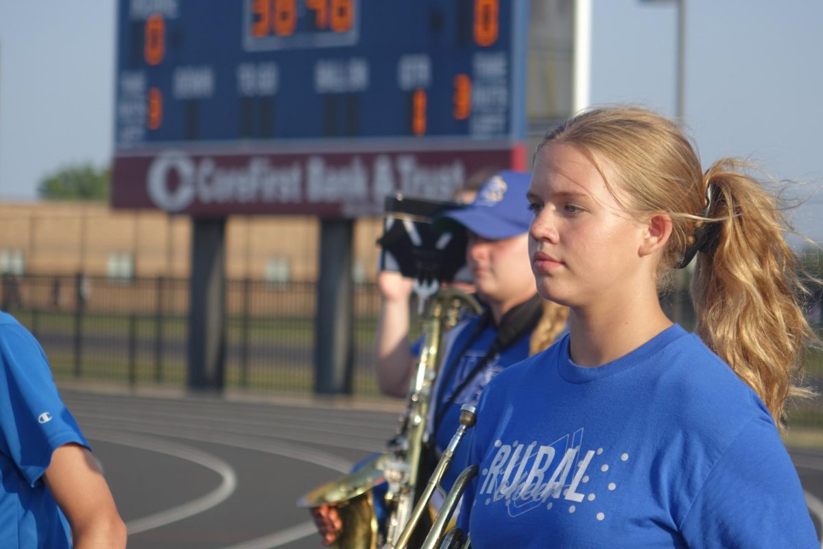 Before playing, trumpeter Claire Blackinton marches into the stadium at the high school, performing for the high school football pregame on September 8th. 
