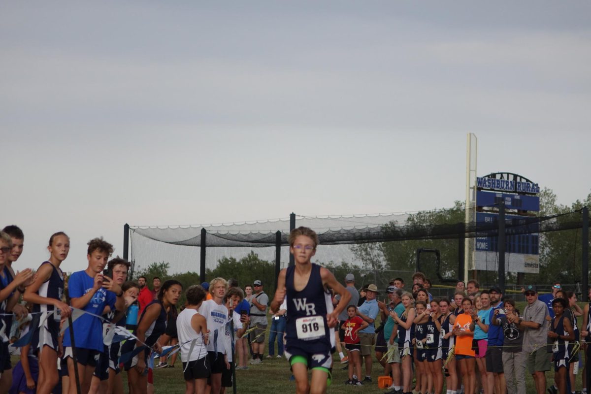 Henry Laubach finishes the race at the WRMS Home Meet. 