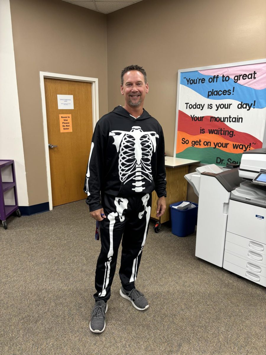 Spooky! On Halloween, Coach Garland was sauntering slowly, spookily in his super scary skeleton style.
