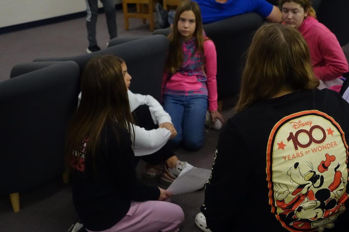 At FCA on October 30th, students gather into a group in the library to talk about the lesson of the week. 7th grader Payton Tryhus, looks forward to possibly being a leader, “I think I want to be a leader, because it looks really fun.”