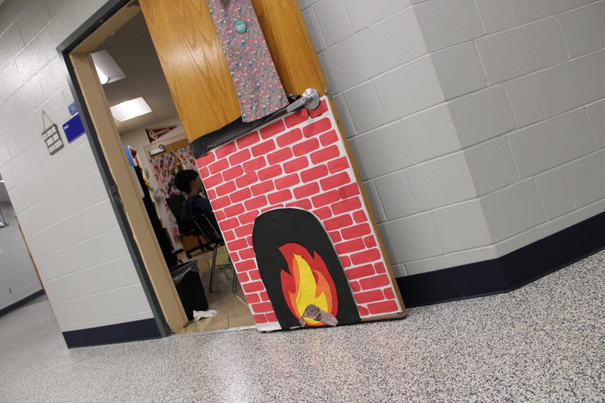 Stuco normally decorates doors with campfires, this door in-particular is Mrs. Jones’s door, decorated beautifully.   Mrs. Jones’s said her  favorite part of christmas    ‘’ I like seeing everyone enjoying the holidays. ’’
