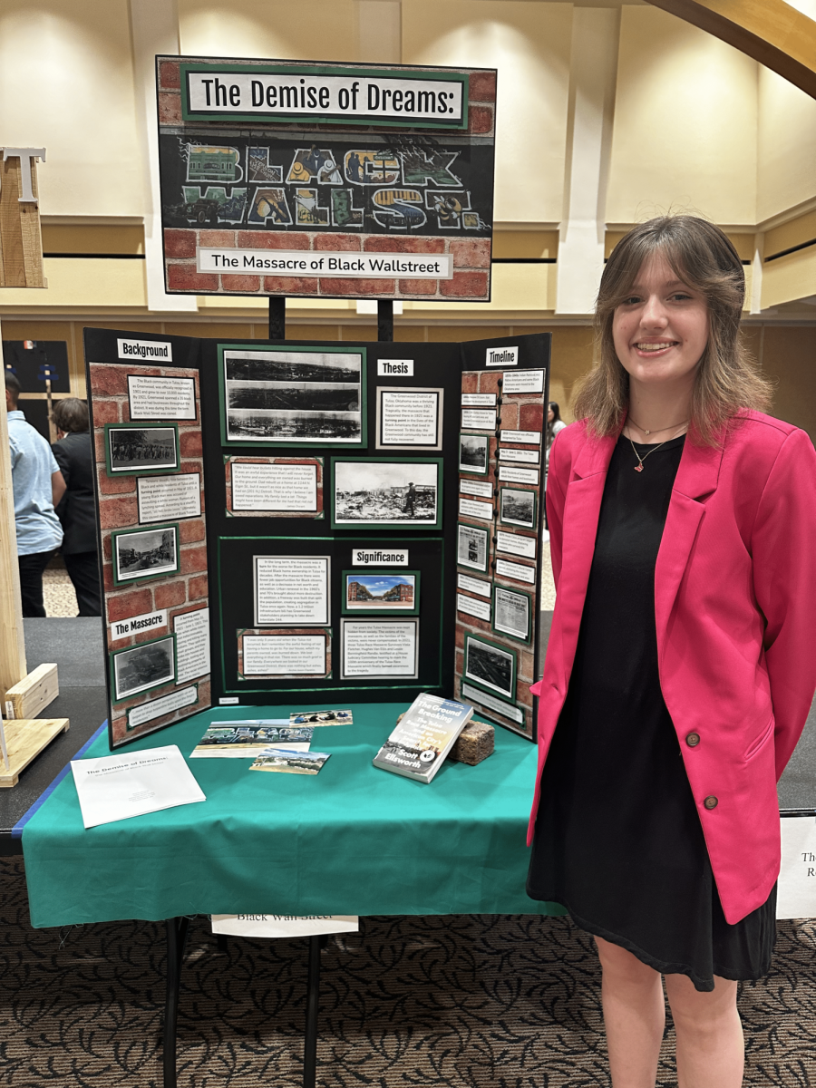 Ava Kuhlmann, an 8th grader, took second place in District History Day with her individual exhibit board, “The Demise of Dreams: The Massacre of Black Wall Street.
