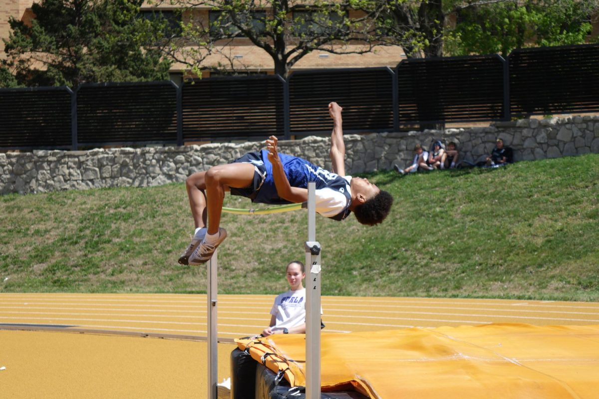 Israel Edmonds clears the bar in high jump on April 23rd at the Emporia Middle School Invite.