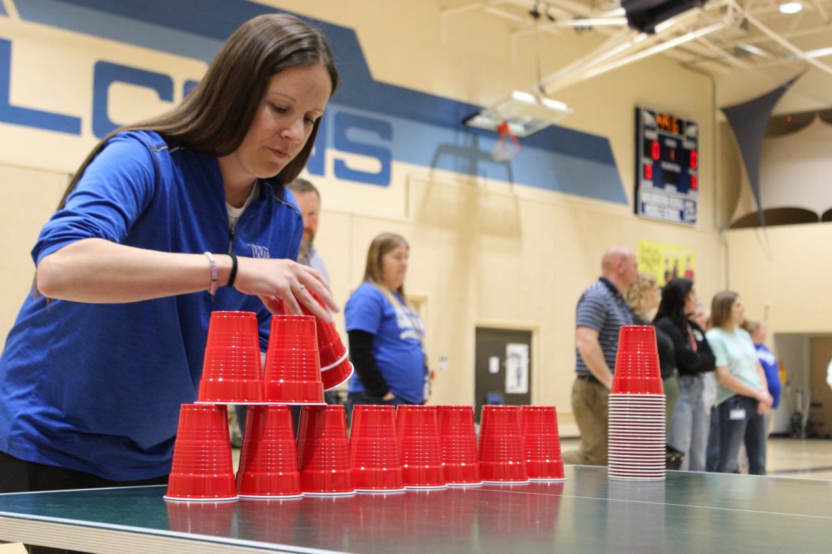 All Stars ELA teacher Mrs. Estensen stacks cups during 7th grade Minute to win it game Stack Attack. One of the most fun parts of the competition is the trash talk between teachers, and winning two years in a row just helps fuel that,” Estensen said.

