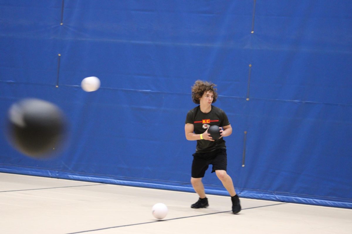 On May 17th, 8th grader Brody Miller on “The Bug Thugs” prepares to throw a dodgeball to eliminate a player on the other team in Gym A. Miller said, “I’m looking forward to dooming a kid in the head because it will be funny.” 
