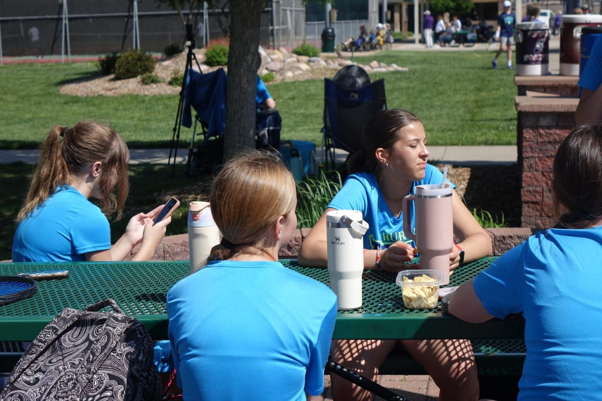 On May 3rd, the girls tennis team eats lunch at Kossover after playing some matches.