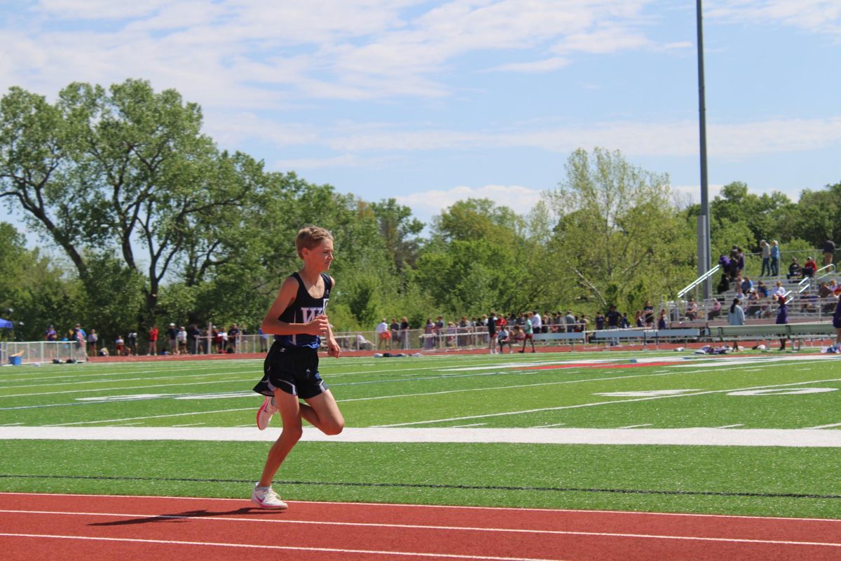 8th grader Henry Laubach, runs the 3200 for track at Manhattan Anothy on May 3rd