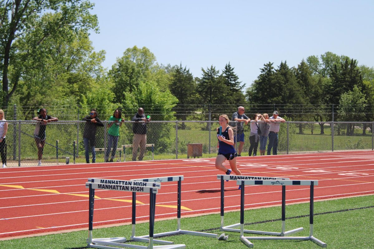 8th grader Kaylee Wray, runs as fast as she can at Manhattan Anothy on May 3rd.