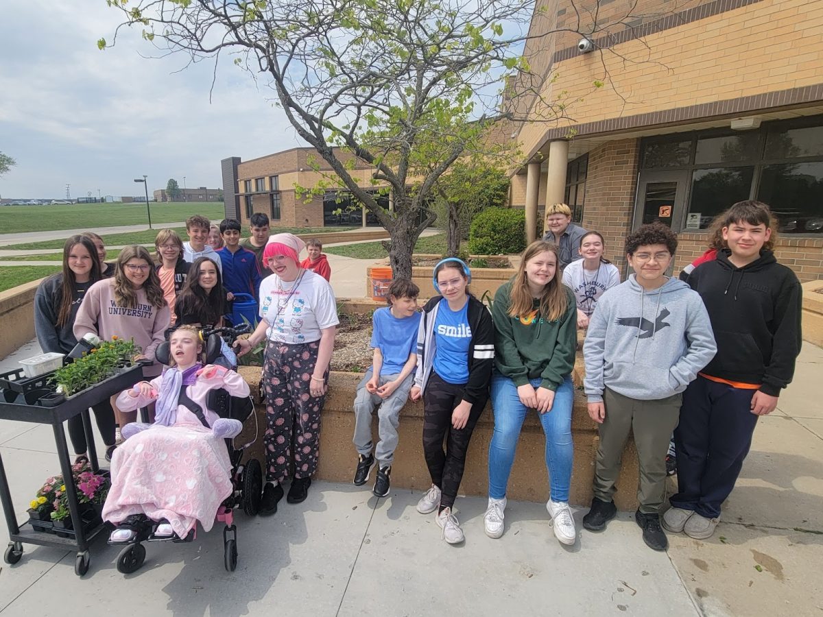On April 24th the 8th grade WAVE science class went out to prepare for community day after school. 