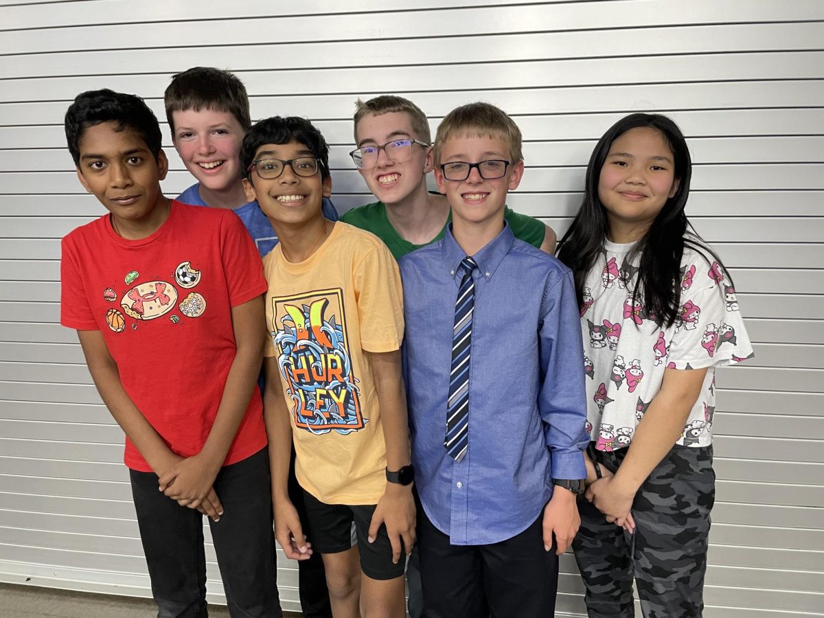 The 7th grade Scholars Bowl team, Prajeet Akula, John Conard, Akul Chamesh, Braxton Bohnstedt, Ethan Lake, and Nikita He pose for a photo after winning 2nd place at the WRMS Scholars Bowl Tournament on Wednesday, April 10th. 