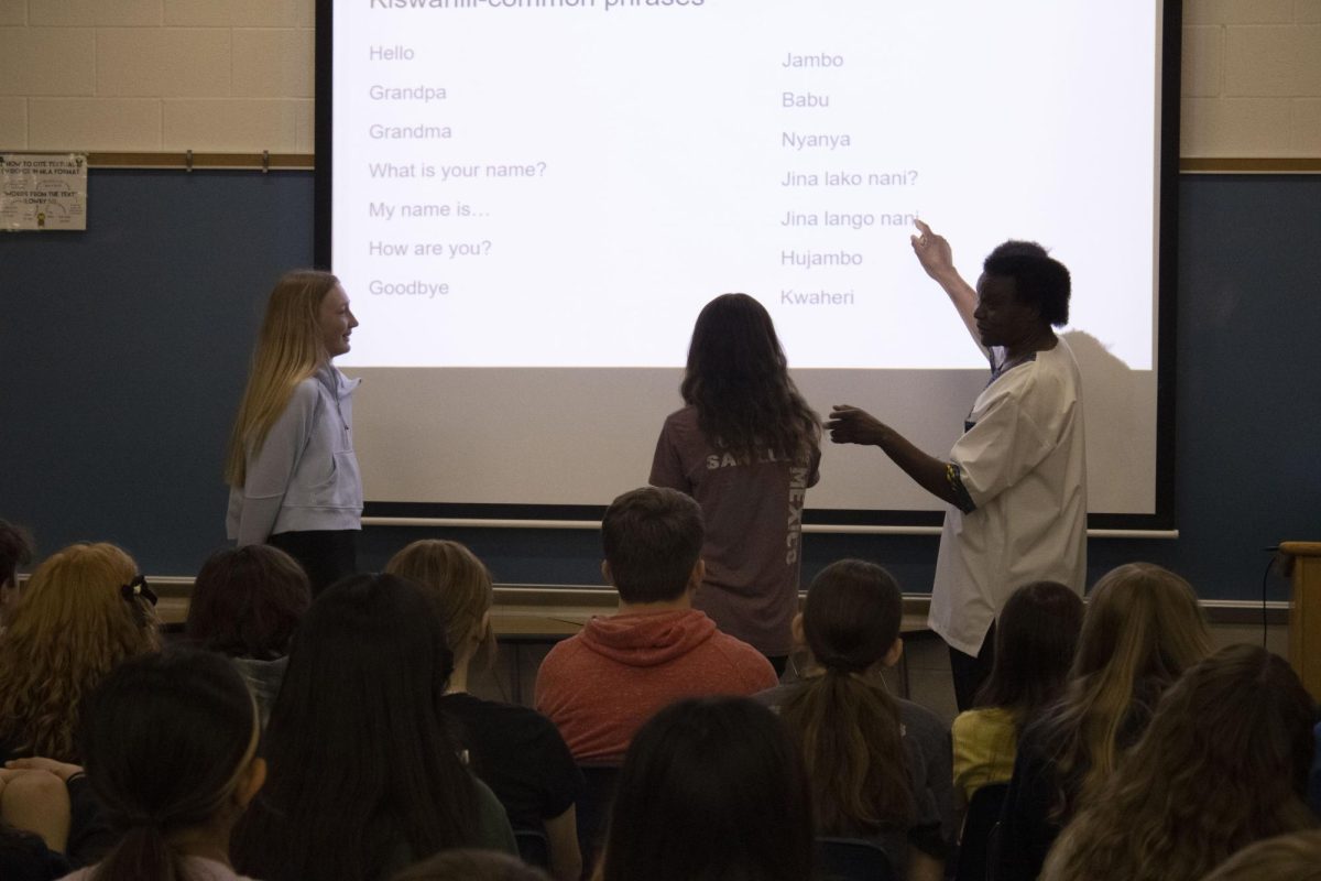 On April 24th in the WRMS library 7th grader Brynn Anderson and Brooklyn Watkins was trying to have a conversation Kiswahili after the presentation. 
