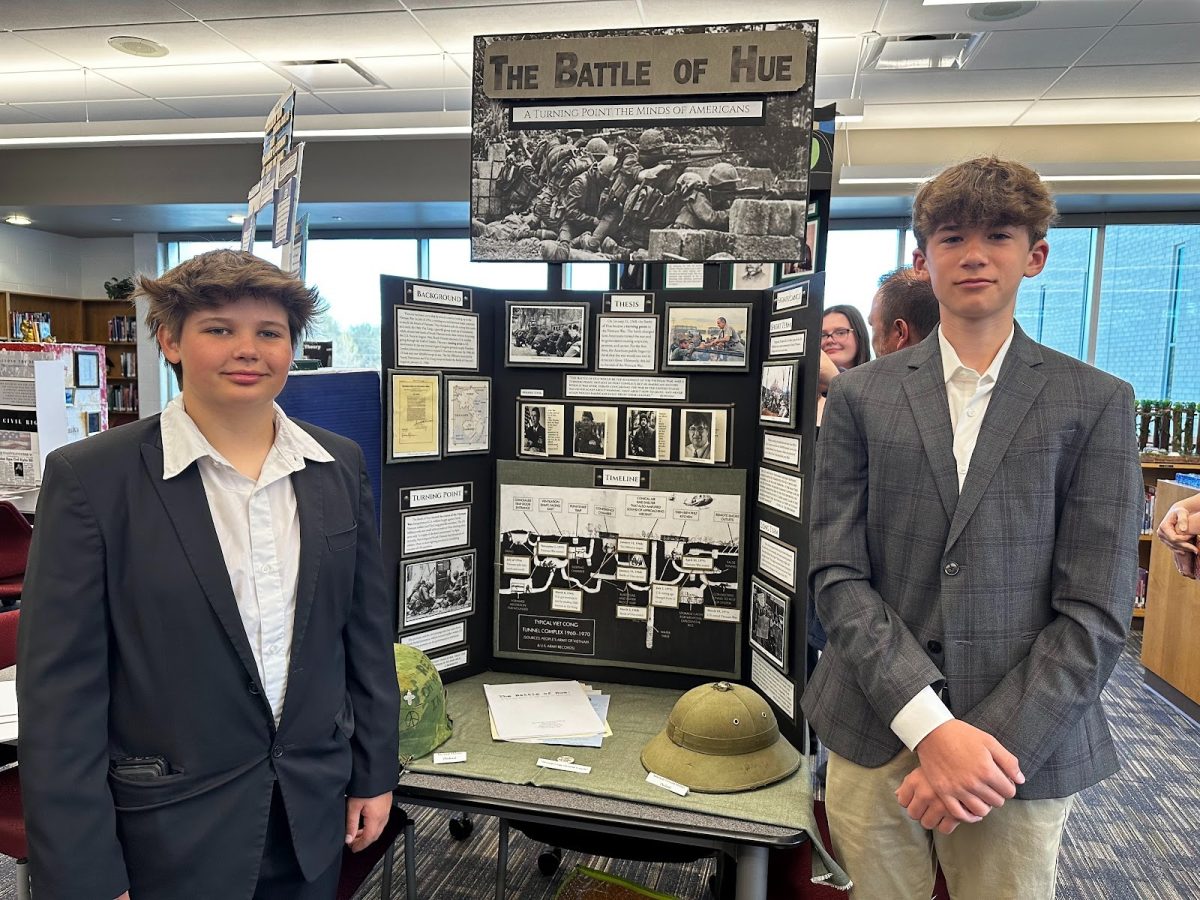 Daniel Ginzburg and Jack Savenko win second place with their exhibit board, "The Battle of Hue: A Turning Point in the Minds of Americans."