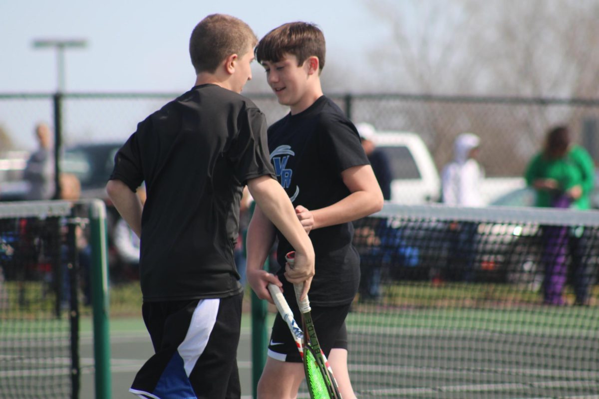 On April 9th, 8th graders Carson OConnor and Braiden Joost celebrate making a point at the Quad, at WRMS. 
