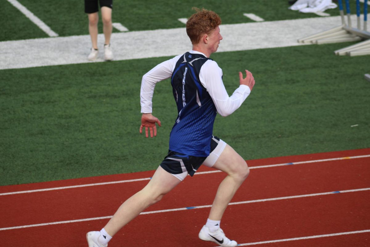 On April 19th, 8th grader Benson Oetting is running the 400 meters at Seaman. 
