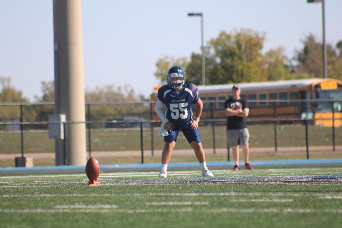 On Oct. 3, Lucas Scoville waits for the opposing team to kick off at the eighth grade football game against Emporia.