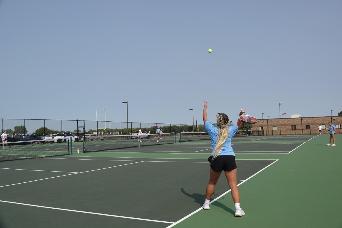 On Sept. 10, 8th grader Aaliyah Blake serves the ball to her opponent from Seaman Middle School during her match at WRMS.