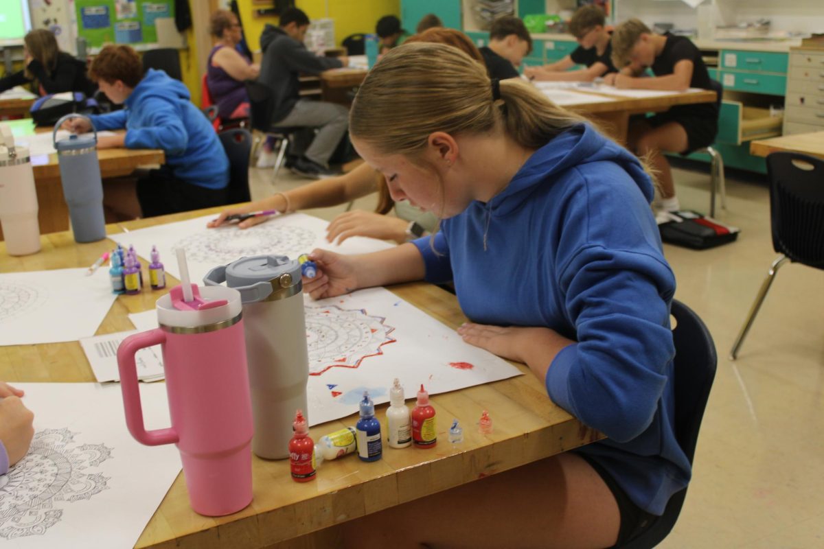 During first hour on Sept. 18, 8th grader Ava Hauschel works on her mandala for art class in Mrs. Munz’s classroom.
