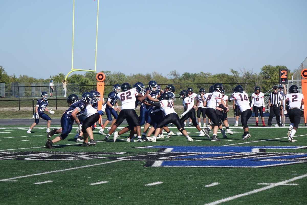 On October 3rd at WRMS, the Falcons defensive line rushes their opponents to get to the quarterback.