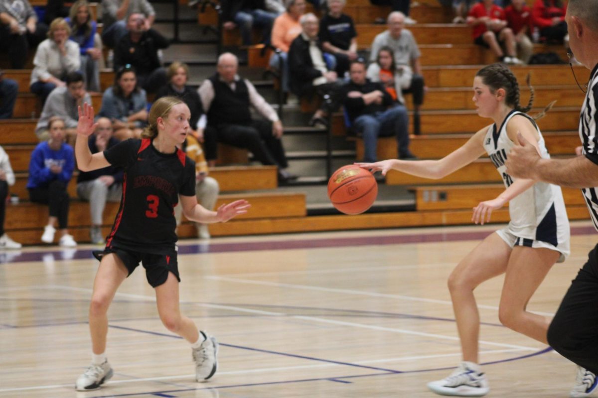 7 grader Sarah Wilson guards the ball from an Emporia player at WRMS on Oct. 31. 