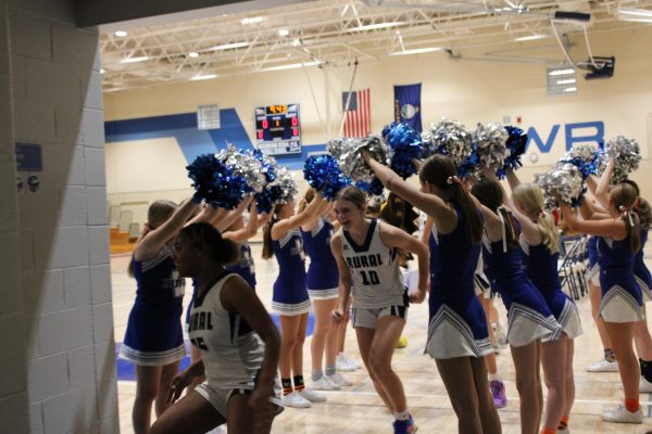 On Oct. 31, 7 grader Kyndall Cochran celebrating with teammates and cheerleaders after winning a home game against Emporia at WRMS. “I enjoy winning and losing with them as a team” Cochran said. 