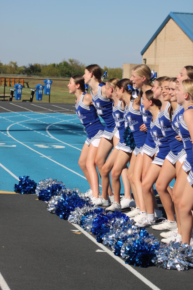 On Aug. 12, the eighth grade cheer squad pumps up the crowd with a timeout cheer at the WRMS vs. Junction football game.