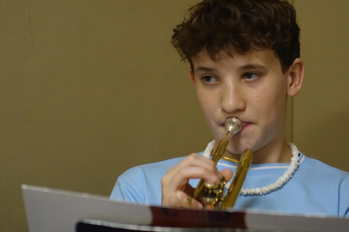 On Nov. 12th, Chase Ryser practices songs on his trumpet for the upcoming concert.