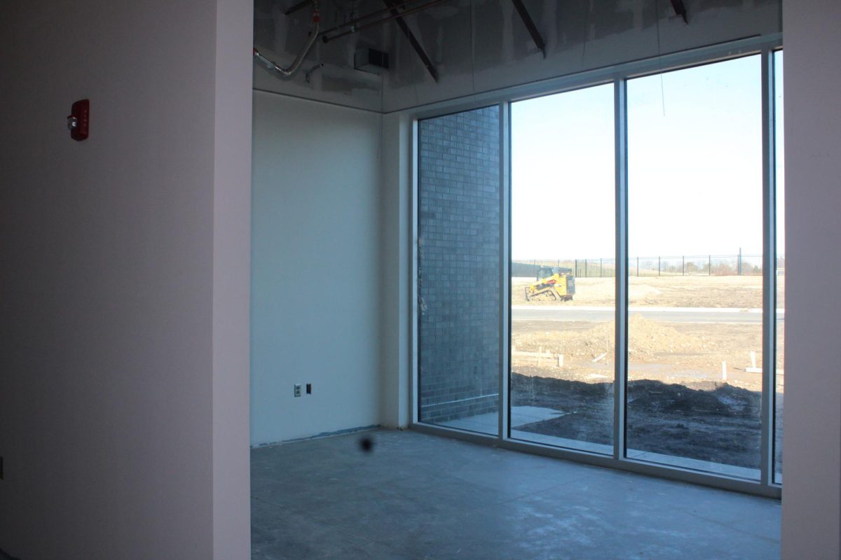 An office space looking out toward the tennis courts.