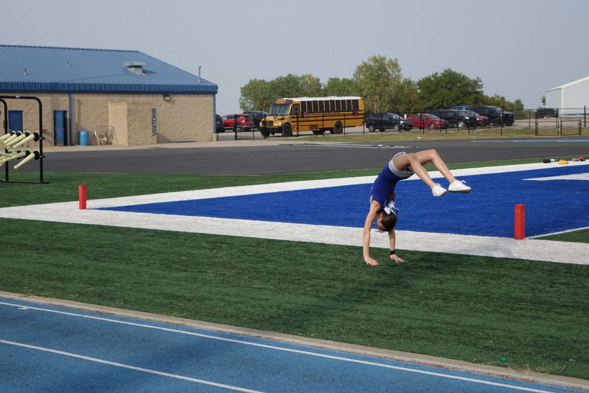 On Sept. 12, Addison Ostermann tumbles on the field at the WRMS football game. 