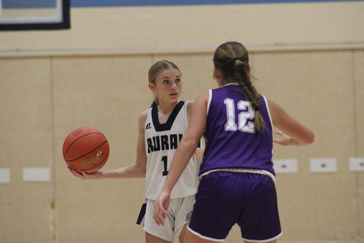 8th grader Aly Hinck, looks for one of teammates to pass the ball to during their game against Susan B. Anthony on Nov. 12 at WRMS. 