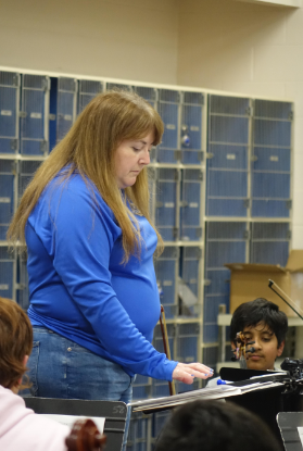 On Nov. 5, Mrs. McLeland directs orchestra during rehearsal for their concert on Nov. 6. The orchestra performed the pieces, Dinosaur Damage, Cripple Creek, Fancy Fiddles. 
