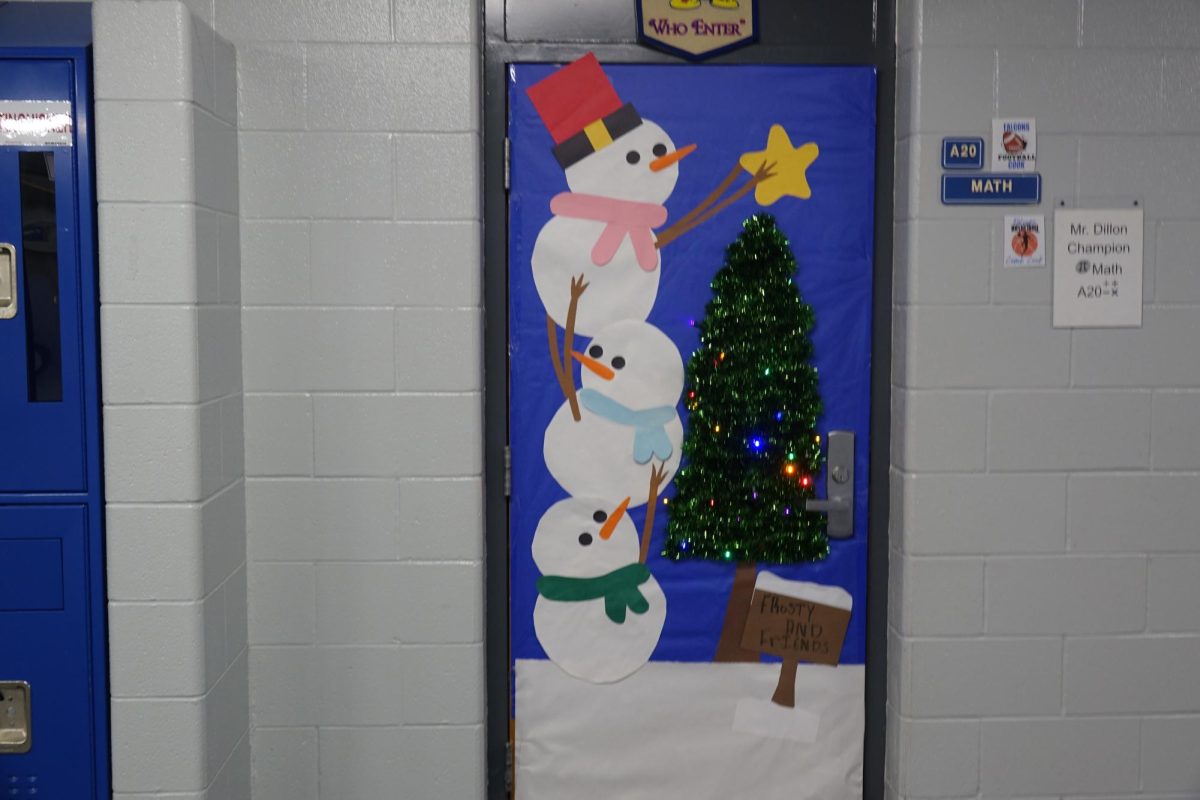 Mr. Dillon's students decorate his door during advisory in the champions pod to have a shot at winning the door decorating competition.