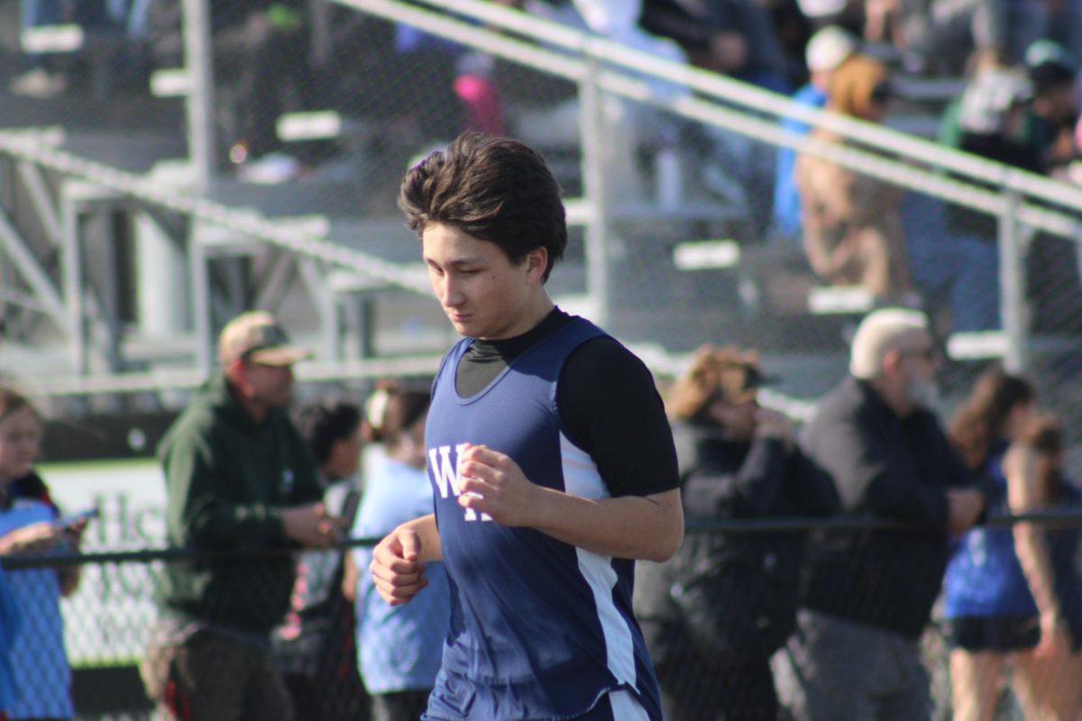 Seventh grader Nolan Un completes the 100-Meters Sprint During the track meet on April 8 at WRMS.
